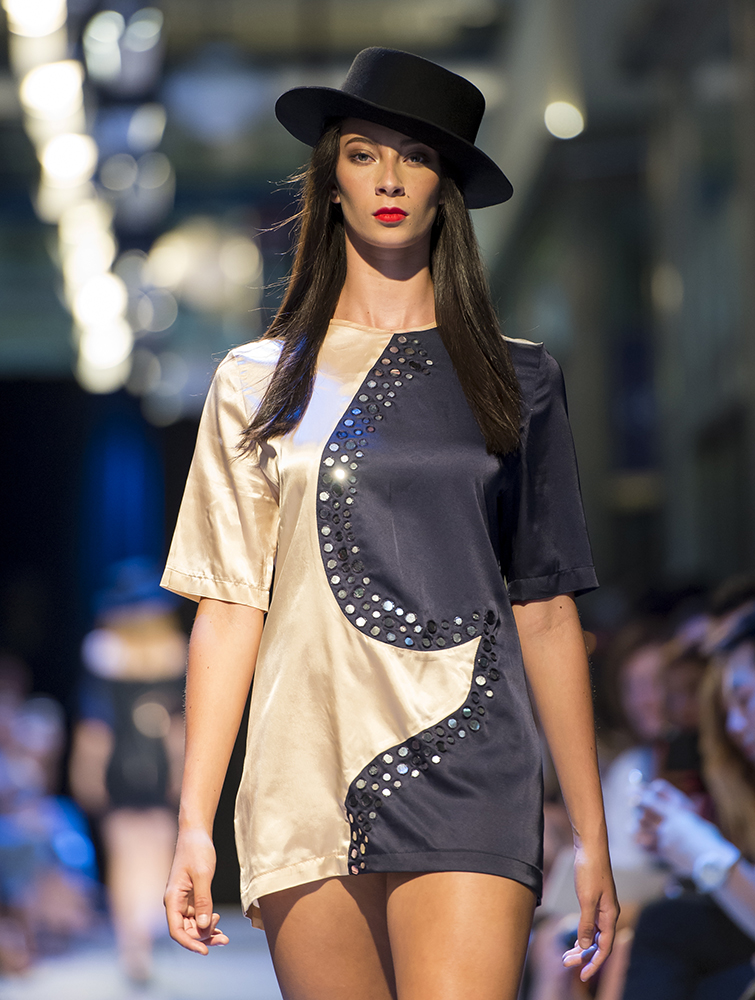 fashion model with hat on runway